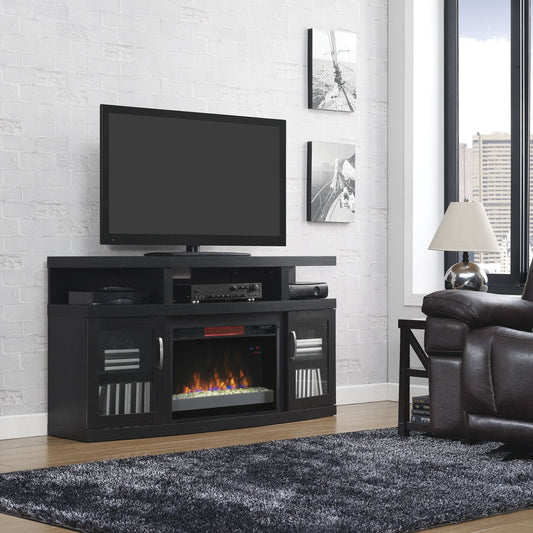 Living room with black leather sofa, TV stand with electric fireplace, and cityscape view.