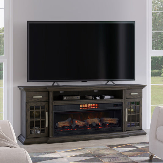 TV stand with electric fireplace and TV above it in a room with large windows.