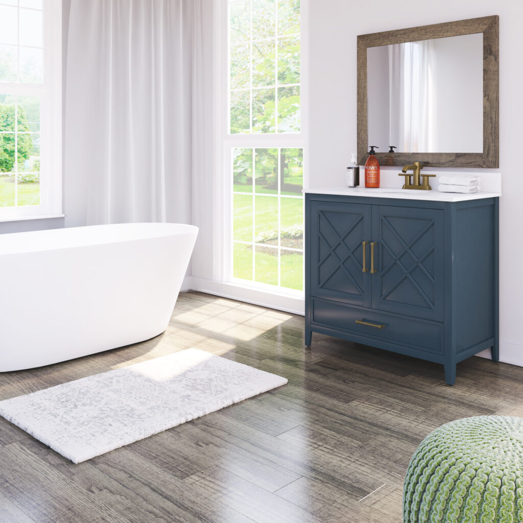 A teal vanity in a white bathroom is a simple yet effective way to start incorporating more color in 