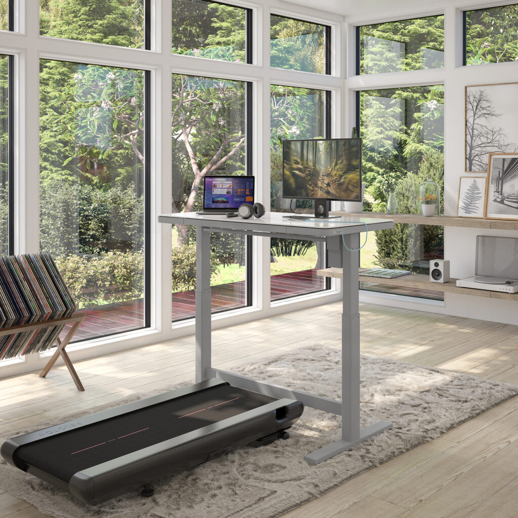 this adjustable standing desk is both pleasing to look at and large enough for a walking pad underneath